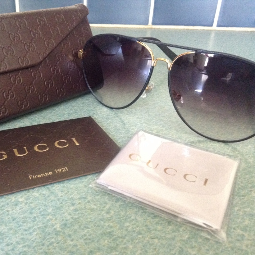 Gucci sunglasses gold black leather aviator 2887/s